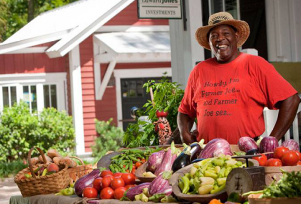 Local farmer selling fresh produce at Bluffton SC farmers market