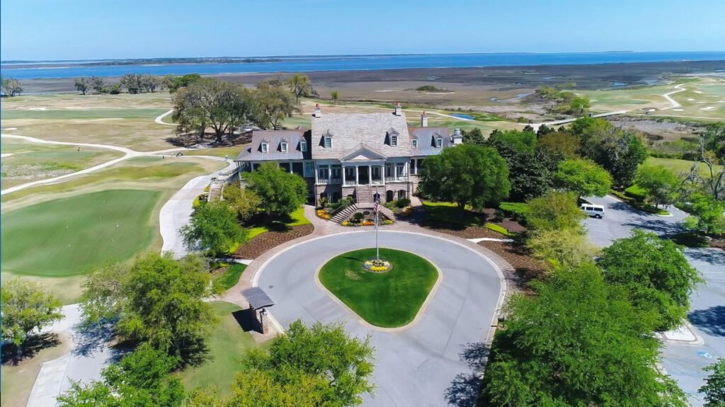 Colleton River Bluffton SC Real Estate Elegant clubhouse overlooking golf course at Colleton River Club