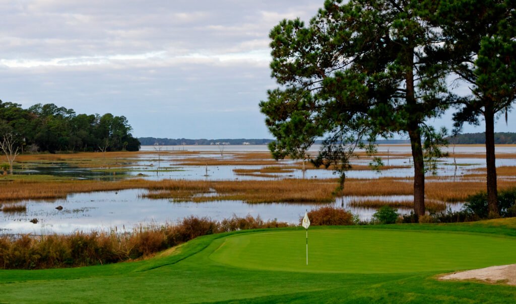 Colleton River Bluffton SC Real Estate golf fairway along marsh and water at colleton river club, bluffton